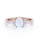 Four Prong Basket Set 1.35 Carat Pear Cut Ethiopian Opal And Diamond Seven Stone Engagement Ring In White Gold