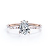 Classic Pave 0.7 carat Pear Moissanite and diamond Engagement Ring in White Gold