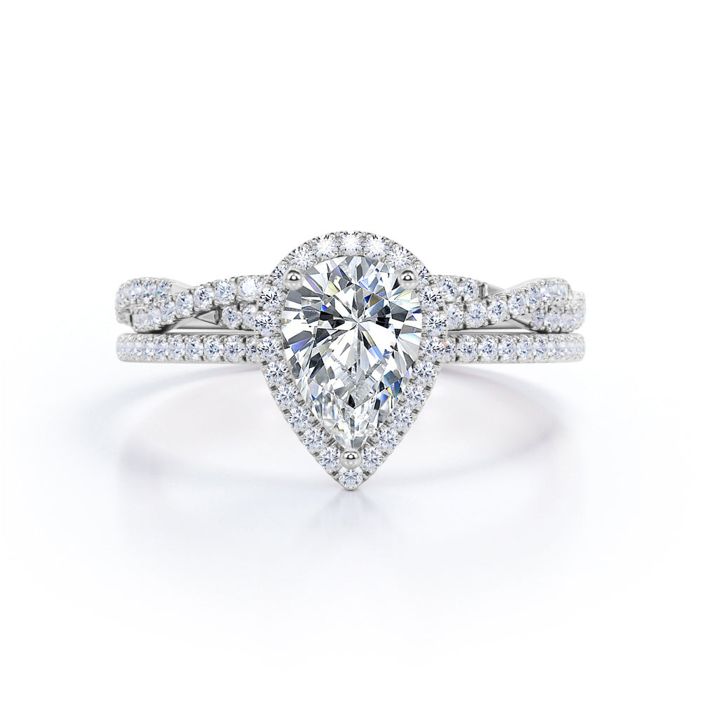 1.25 Carat Pear Cut Moissanite And Diamond Twisted Wedding Ring Set In White Gold