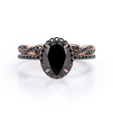 Four-Prong Halo 1.75 TCW Oval-Shaped Lab Created Black Diamond Pave Twisted Eternity Bridal Set in White Gold