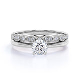 Artdeco 1.25 Carat Round cut Moissanite and Diamond Wedding Bridal Ring Set in 10k White Gold
