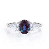 1.35 Carat Oval Cut Lab Created Alexandrite And Diamond Seven Stone Engagement Ring In White Gold