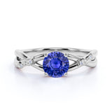 Infinity Inspired 1.25 Carat Round Cut Sapphire and Diamond Engagement Ring in White Gold