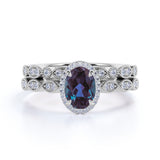 Vintage Hidden Halo 1.75 Carat Oval Cut Lab Alexandrite and Diamond Art Deco Bridal Set Rings