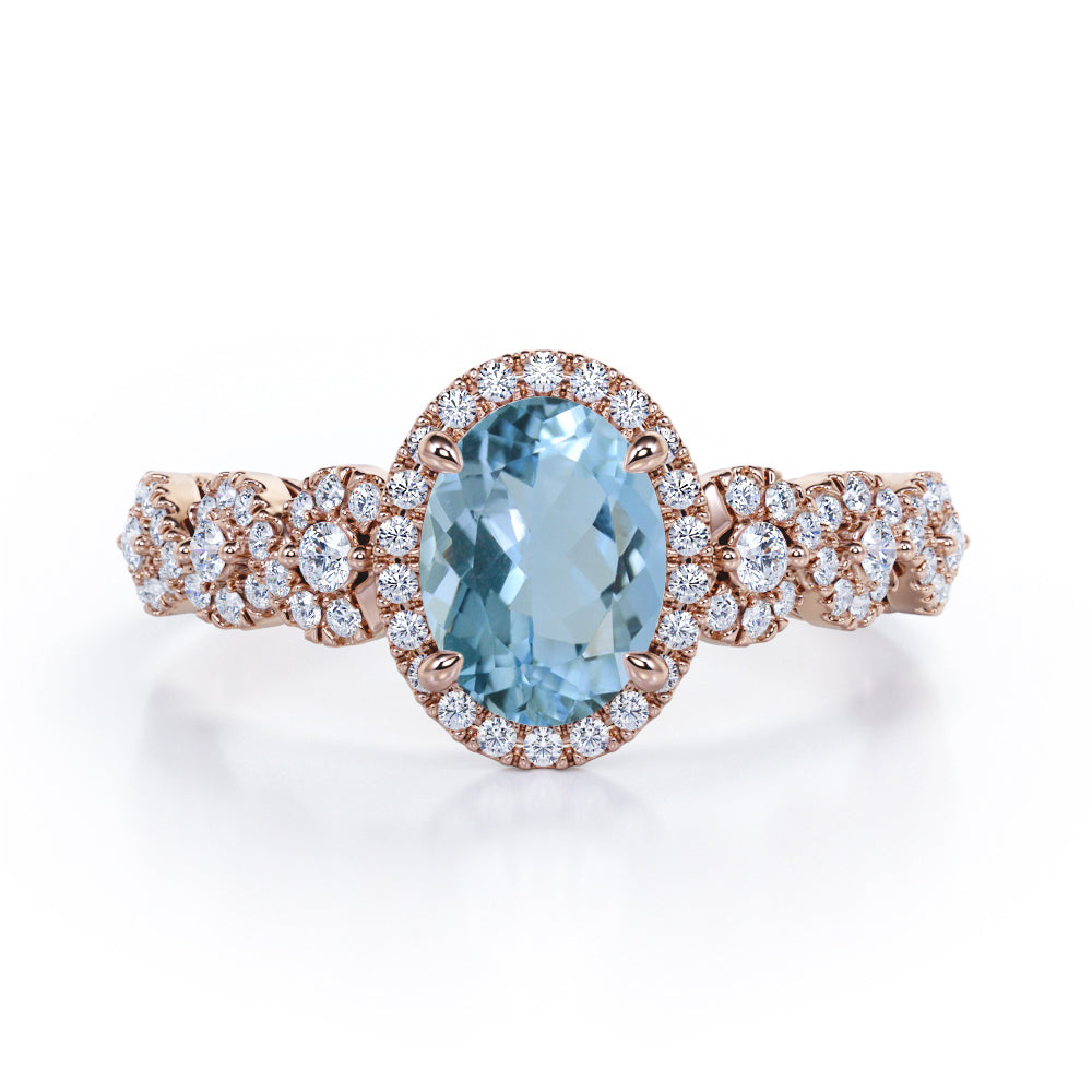Twisted 1.45 Carat Oval Cut Aquamarine And Diamond Halo Engagement Ring In White Gold