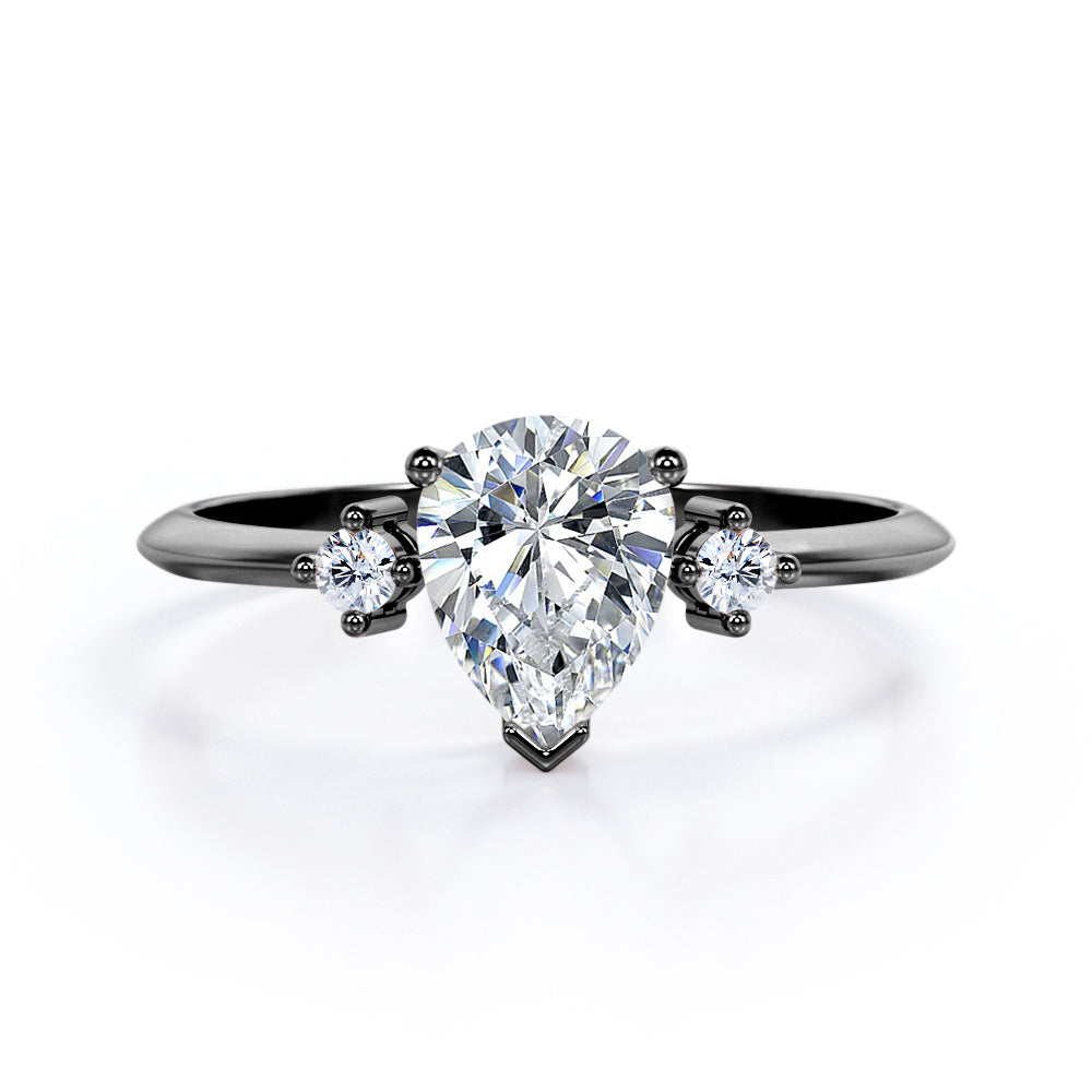 Minimalist Three Stone 0.55 carat Pear Moissanite and Diamond Engagement Ring in Rose Gold