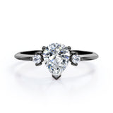 Minimalist Three Stone 0.55 carat Pear Moissanite and Diamond Engagement Ring in Rose Gold