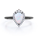 Vintage Inspired 1.35 Carat Tear Drop Fiery White Opal And Diamond Halo Engagement Ring In White Gold