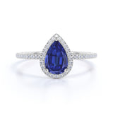 Elegant Pave 1.50 Carat Pear Shape Sapphire and Diamond Halo Engagement Ring in White Gold