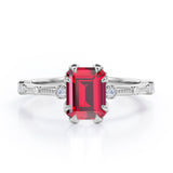 Sharp Eight Claws 1.10 Carat Emerald Cut Ruby And Diamond Beaded Engagement Ring In White Gold