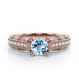 Beaded Four Prongs 1.40 Carat Round Cut Aquamarine And Diamond Vintage Art Deco Engagement Ring In Rose Gold