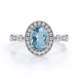 Vintage Halo 1.35 Carat Oval Cut Aquamarine And Diamond Art Deco Engagement Ring In Rose Gold