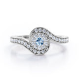 Wrapped Round 0.65 carat Round Aquamarine and Moissanites Bypass Engagement Ring in White Gold