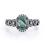 Twisted 1.45 Carat Oval Cut Green Moss Agate And Diamond Halo Engagement Ring In Black Gold