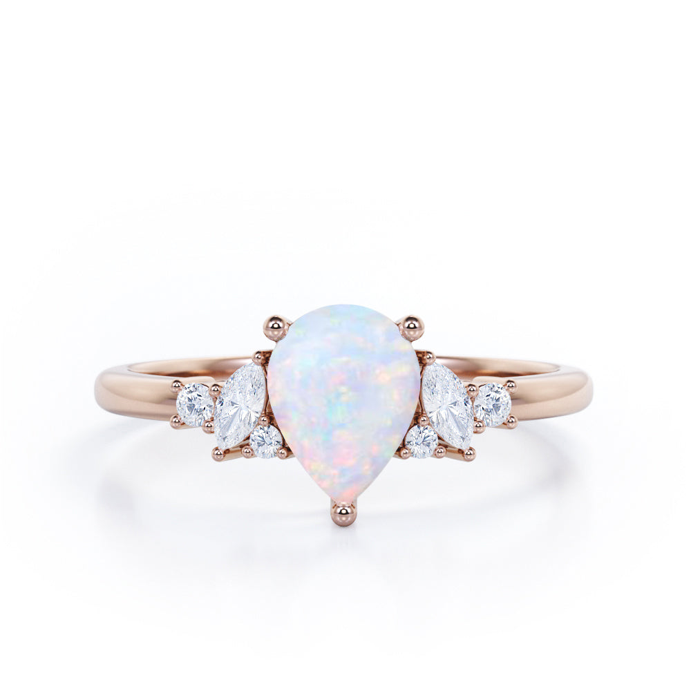 Seven Stone 0.6 Ct Pear Cut Lab Created Opal Engagement Ring