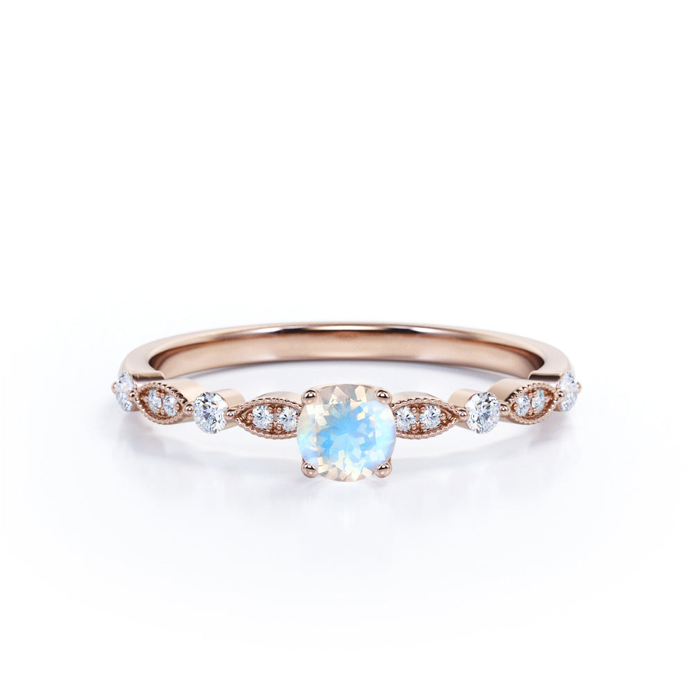 Sweet 0.6 carat Round Moonstone and Moissanite Engagement Ring in White Gold