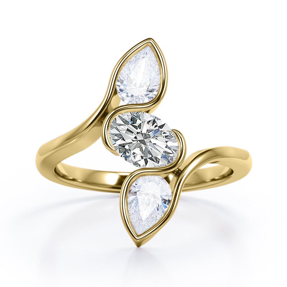 Distorted Line Three Stone 1 carat Oval and Pear Moissanite Ring in Rose Gold