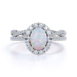 Snowflake 1.75 Carat Oval Shape Fire Opal and Diamond Bridal Ring Set with Crown Band in Rose Gold