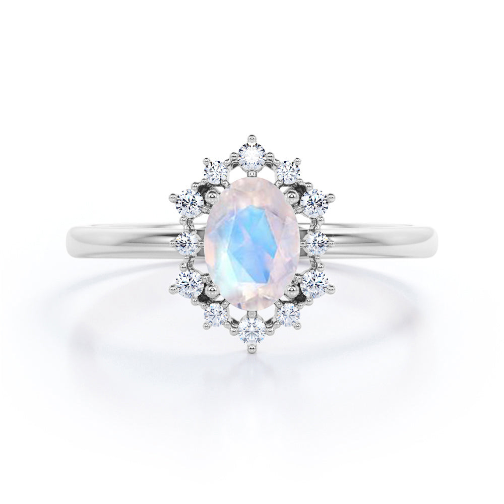 Netting Halo 0.6 carat Oval Moonstone and Moissanite Promise Ring in Black Gold