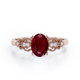 Swirly 0.5 carat Oval Lab Ruby and Diamonds Antique Engagement Ring in Rose Gold