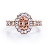Vintage Floral Halo 0.7 carat Oval and Round Morganite and diamond Engagement Ring in Rose Gold