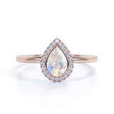 Classic 1.25 Carat Pear Shape Rainbow Moonstone and Diamond Halo Engagement Ring in Rose Gold
