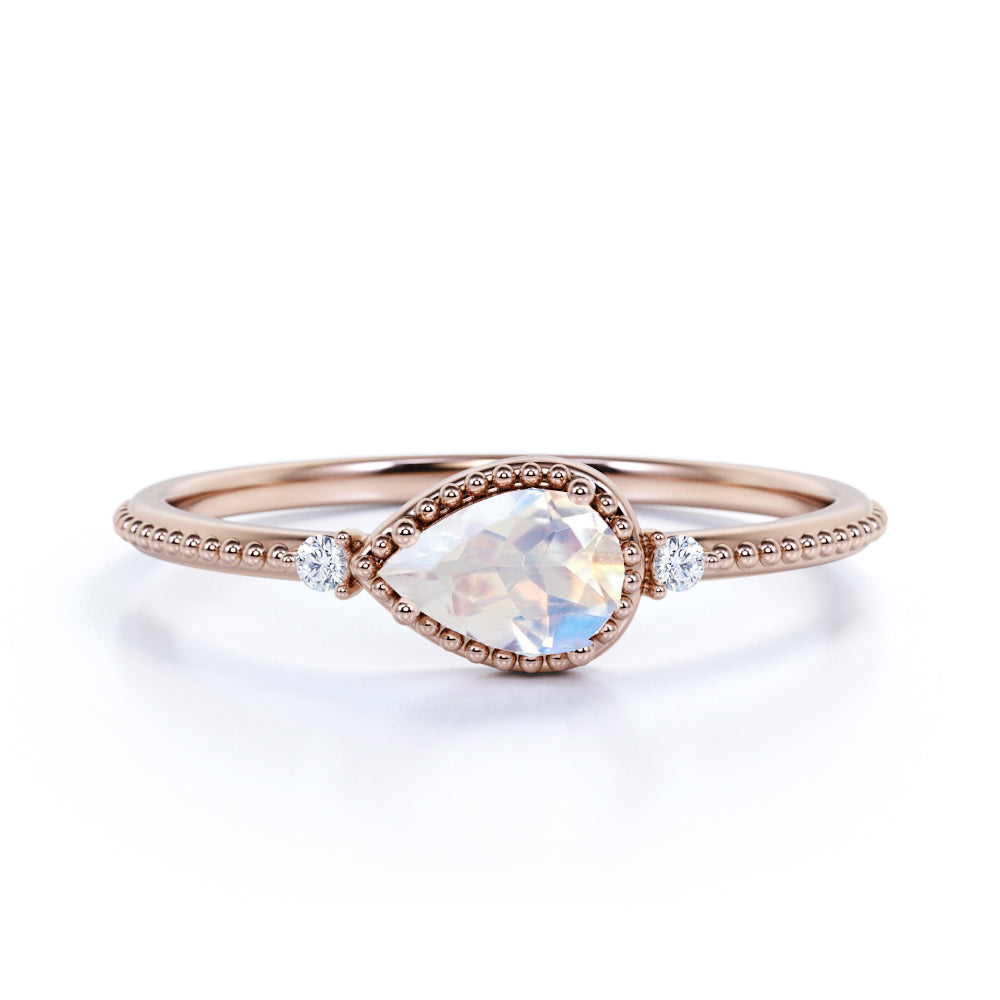 Sideways 1.10 Carat Pear Rainbow Moonstone and 3 Stone Diamond Elegant Engagement Ring in White Gold