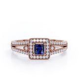 Split-Shanked Pave 1.55 Carat Princess Cut Blue Sapphire and diamond Milgrain-Bordered Halo Engagement Ring in White Gold