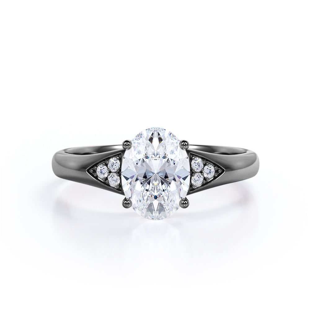 Tapered Shank 7 Stone 1.35 Carat Oval Cut Moissanite and Diamond Prong Basket Engagement Ring in White Gold