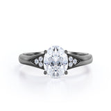 Tapered Shank 7 Stone 1.35 Carat Oval Cut Moissanite and Diamond Prong Basket Engagement Ring in White Gold