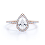 1.50 Carat Pear Cut Moissanite and Diamond Halo Engagement Ring in White Gold