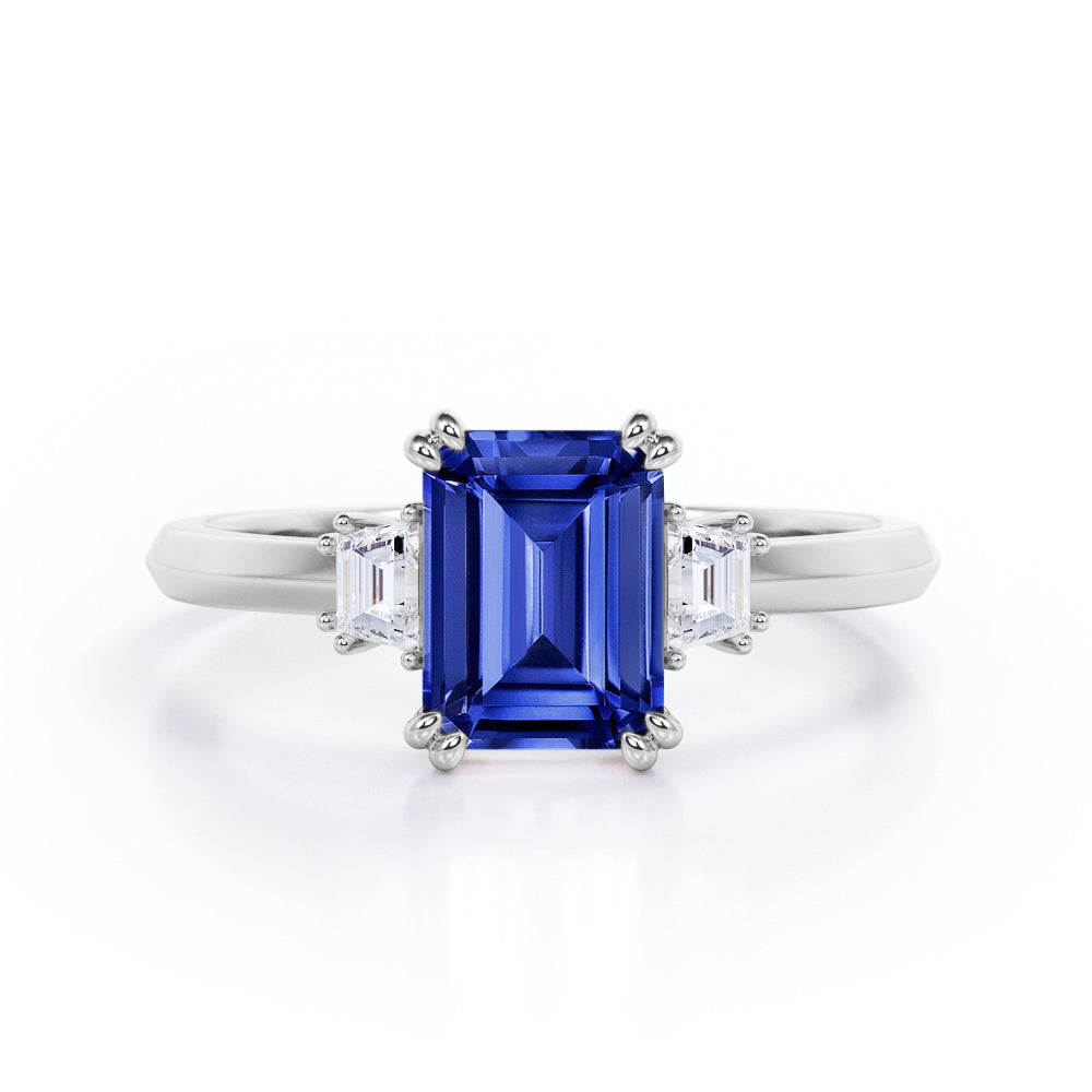 Eight Prongs 1.10 Carat Emerald Cut Sapphire And Diamond Three Stone Engagement Ring In Rose Gold