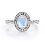 Antique Art Deco 1.35 Carat Oval Cut Moonstone And Diamond Halo Engagement Ring In White Gold