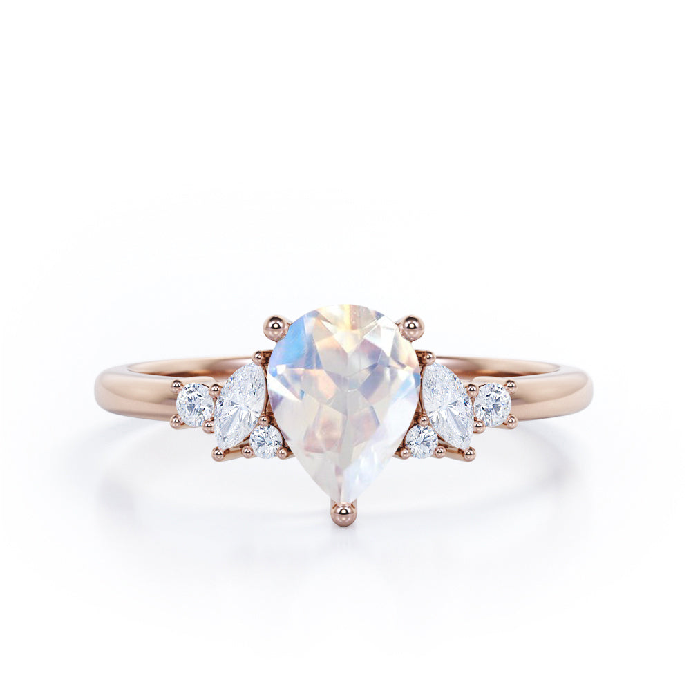 Fashionable 7 Stones 0.6 carat Pear Moonstone and Diamond Engagement Ring in White Gold
