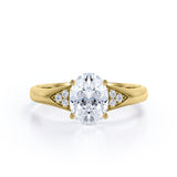 Tapered Shank 7 Stone 1.35 Carat Oval Cut Moissanite and Diamond Prong Basket Engagement Ring in White Gold
