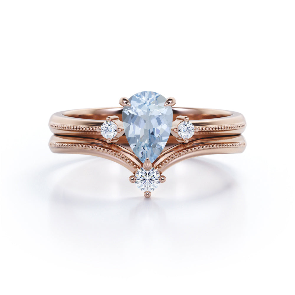 1.15 Carat Pear Cut Aquamarine And Diamond V-Shaped Wedding Ring Set In White Gold