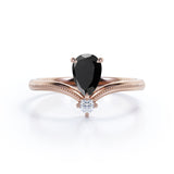 1 carat tear drop cut Black Diamond V shaped style engagement ring in white gold