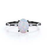 Sharp Four Claws 1.10 Carat Oval Cut Fire Opal And Diamond Seven Stone Engagement Ring In White Gold
