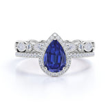 Vintage Pave Set 2.25 Carat Pear Cut Sapphire and Diamond Halo Wedding Set with Art Deco Eternity Band in White Gold