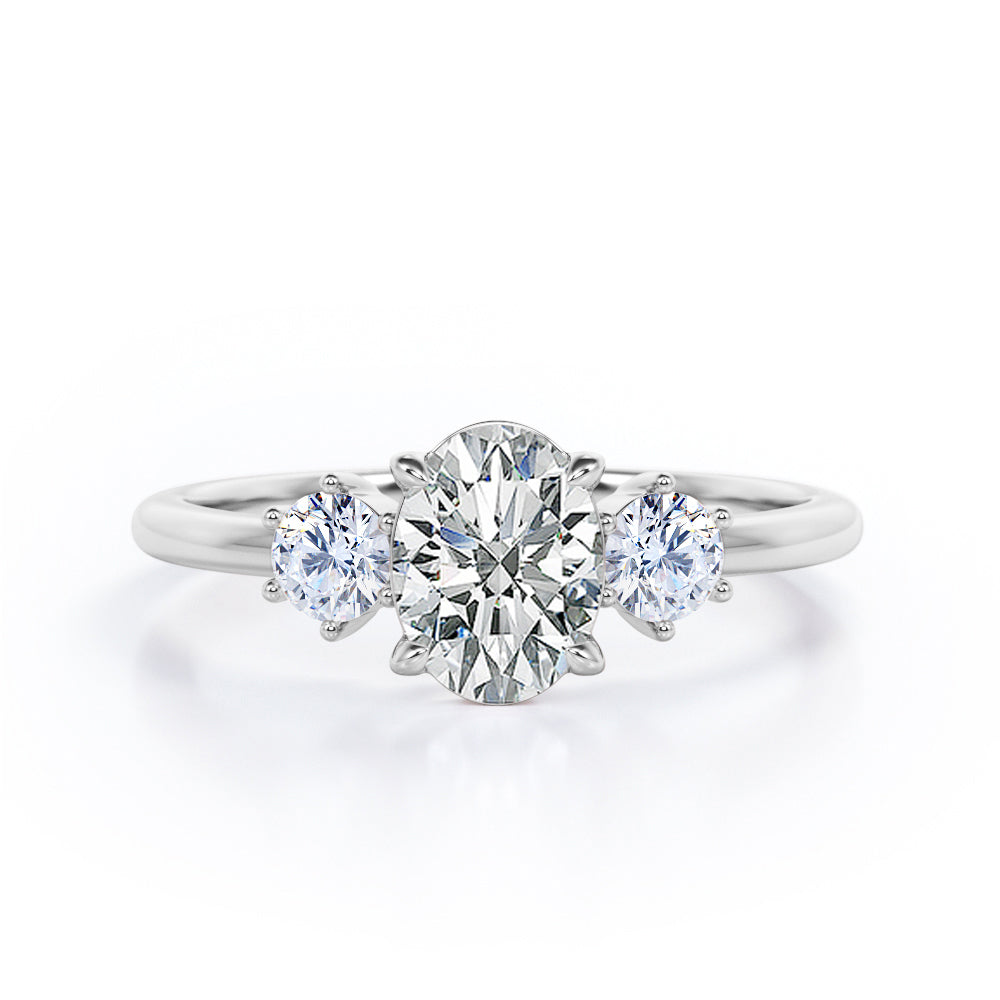 Simple Trio Stone 0.8 carat Oval Moissanite and Diamond Engagement Ring in Rose Gold