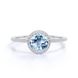 1.50 Carat Round cut Aquamarine and Diamond Halo Engagement Ring in Rose Gold