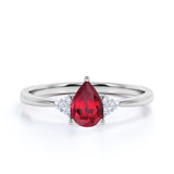 1.25 Carat Pear Shape Lab Ruby and Eight-Stone Diamond Engagement Ring in White Gold