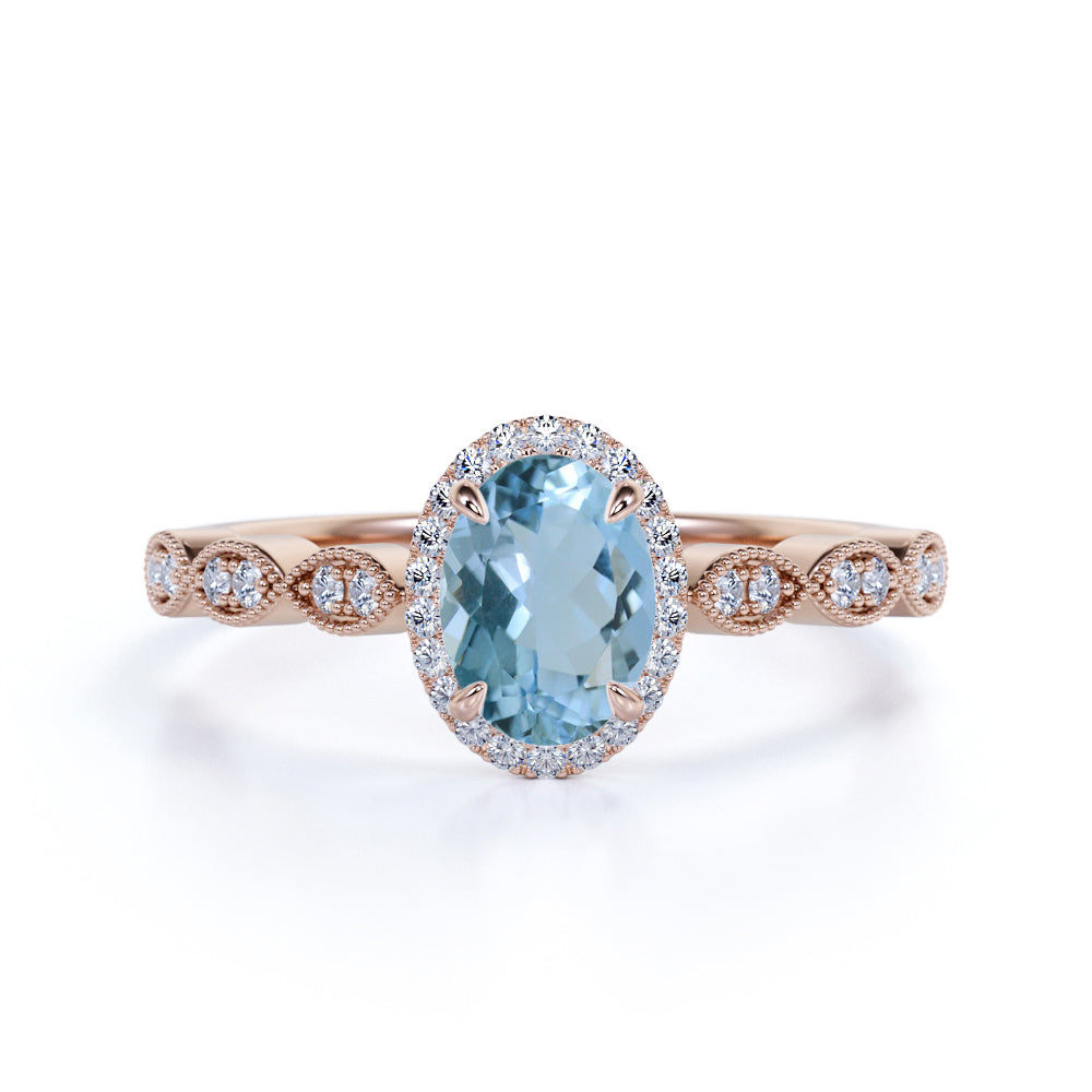 1.25 Carat oval cut Aquamarine and Diamond Halo Wedding Ring in Rose Gold