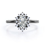 Floating Halo 0.6 carat Oval Moissanite and Diamond Engagement Ring in Rose Gold