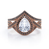 Milgrain Halo-Style 1.75 TCW Pear Cut Moissanite with Lab Created Black Diamond Pave Channel Wedding Ring Set in Black Gold