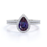 Intricate Traditional Halo 1.75 Carat Pear Cut Lab Grown Alexandrite and Diamond Half Eternity Pave Bridal Set Rings