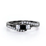 Trellis Three Stones 1 carat Princess Black Diamond Braided Engagement Ring in Rose Gold