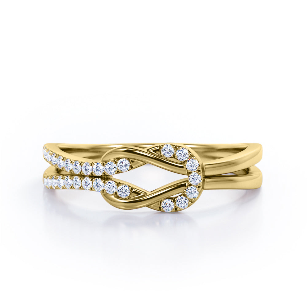 Reef Knot 0.25 carat Round Moissanite/Diamond Split Shank Ring in Roe Gold