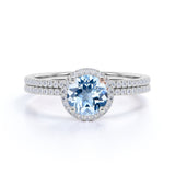 Antique Style 1.75 Carat Round Brilliant Cut Aquamarine and Diamond Halo Bridal Ring set in White Gold