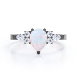 Unique Three Prong 1.35 Carat Tear Drop Precious Fire Opal And Diamond Seven Stone Engagement Ring In Rose Gold